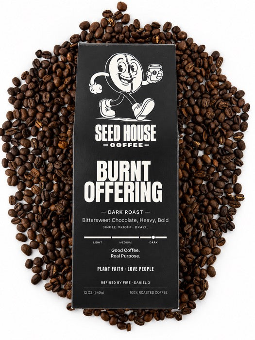 Burnt Offering bag on a bed of coffee beans