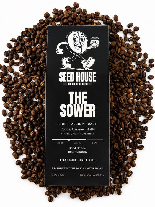 The Sower bag on a bed of coffee beans